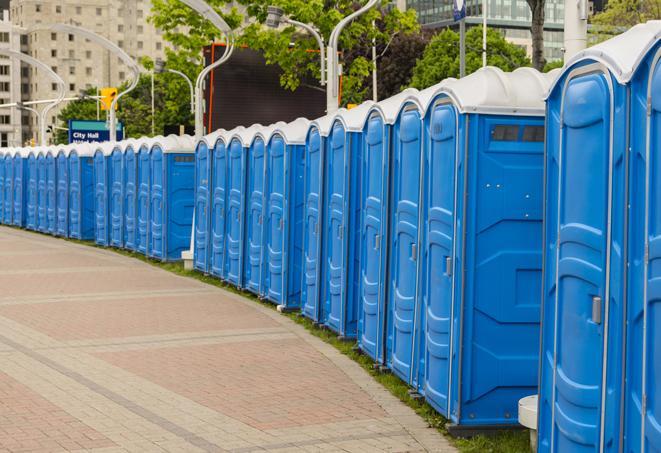 a row of portable restrooms at a fairground, offering visitors a clean and hassle-free experience in klamathfalls